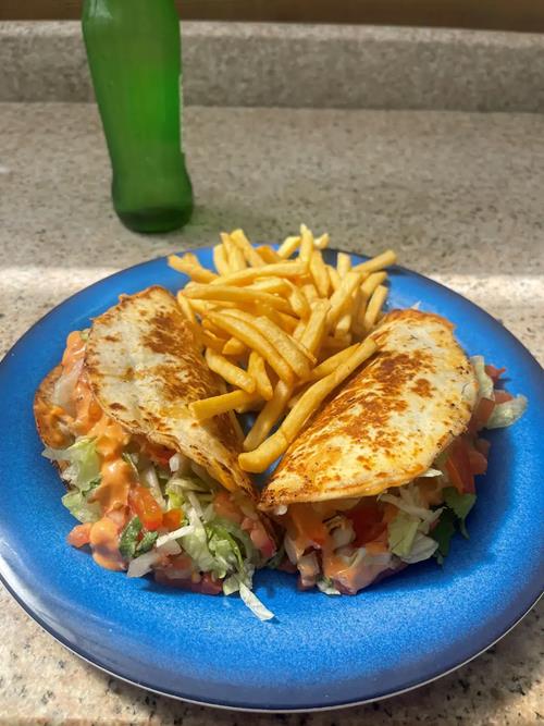 Juicy smashed beef, melty cheese, fresh toppings, and bold Caliente flavor all wrapped in a warm tor(..)